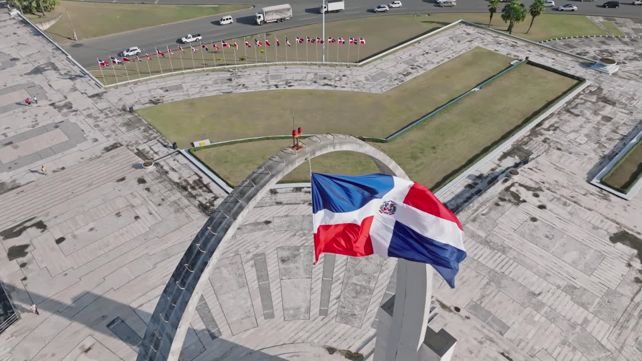 High angle of flag waving in the wind, Plaza de la Bandera at Santo Domingo city, Dominican Republic