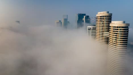 city shrouded in fog