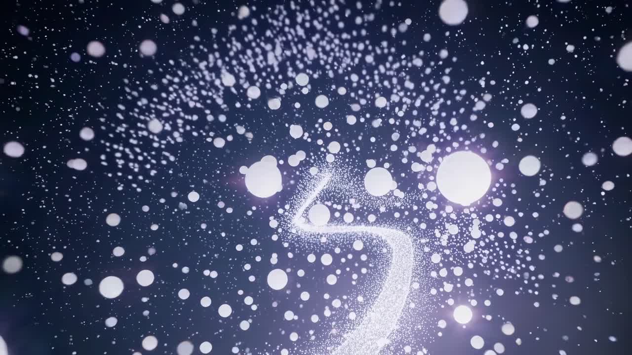 Abstract video with a cosmic theme, featuring a swirling galaxy of glowing particles