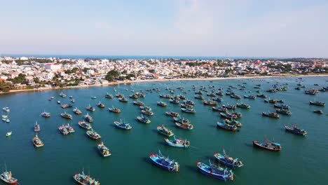 Massive-colorful-Vietnamese-fishing-fleet-spread-out-in-bay-of-Mui-Ne