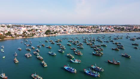 massive colorful vietnamese fishing fleet spread out in bay of mui ne