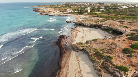 san lorenzo ix strada beach near the case della cittadella in noto, syracuse, italy