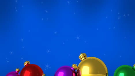 Animation-of-snow-falling-over-christmas-bauble-decorations-on-blue-background