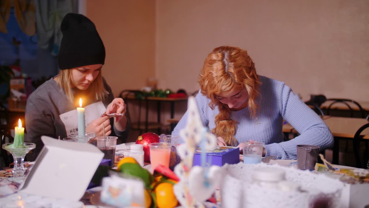 Women crafting Christmas decorations