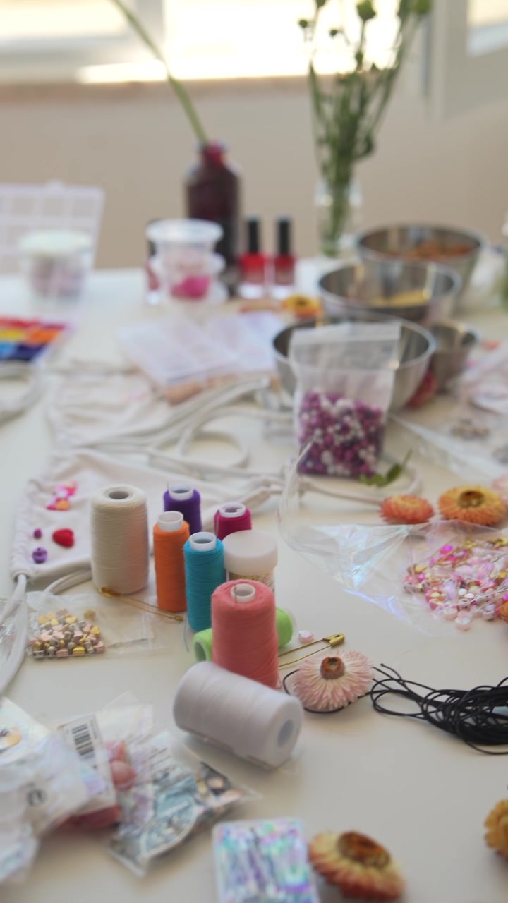 Crafting Table With Sewing Supplies and Decorative Beads