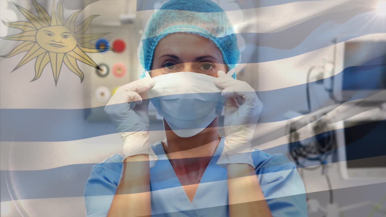 Animação da bandeira do Uruguai tremulando sobre cirurgiã em sala de cirurgia
