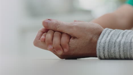 close-up-little-boy-holding-grandmothers-hand-showing-affection-loving-child-showing-compassion-for-granny-enjoying-bonding-with-grandson-family-concept-4k-footage