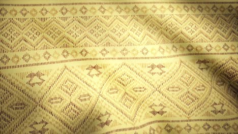 detailed close-up view of a traditional thai fabric