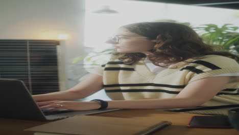 girl using laptop in office with renewable energy