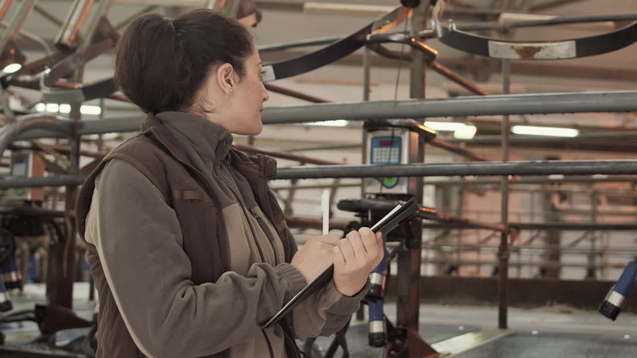 Woman Writing Down Meter Reading