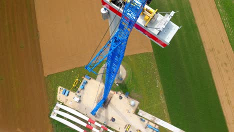 Construction-Of-New-Wind-Turbine-In-Agricultural-Field---drone-top