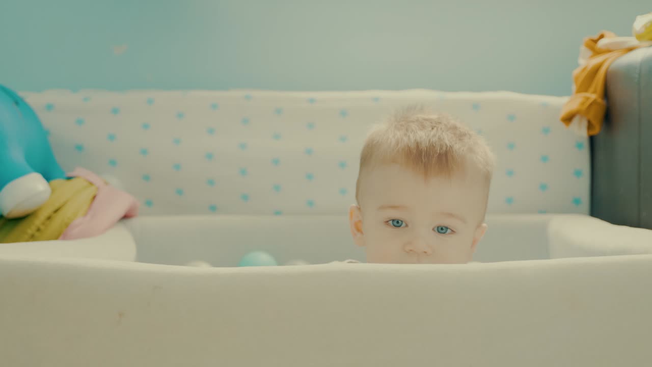 Cute Baby Playing in Crib