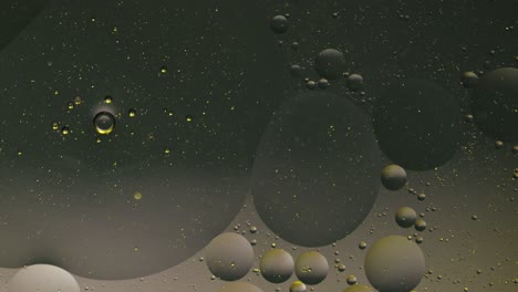 la macroestructura de las burbujas de aceite coloridas. movimiento caótico. fondo multicolor abstracto. patrón