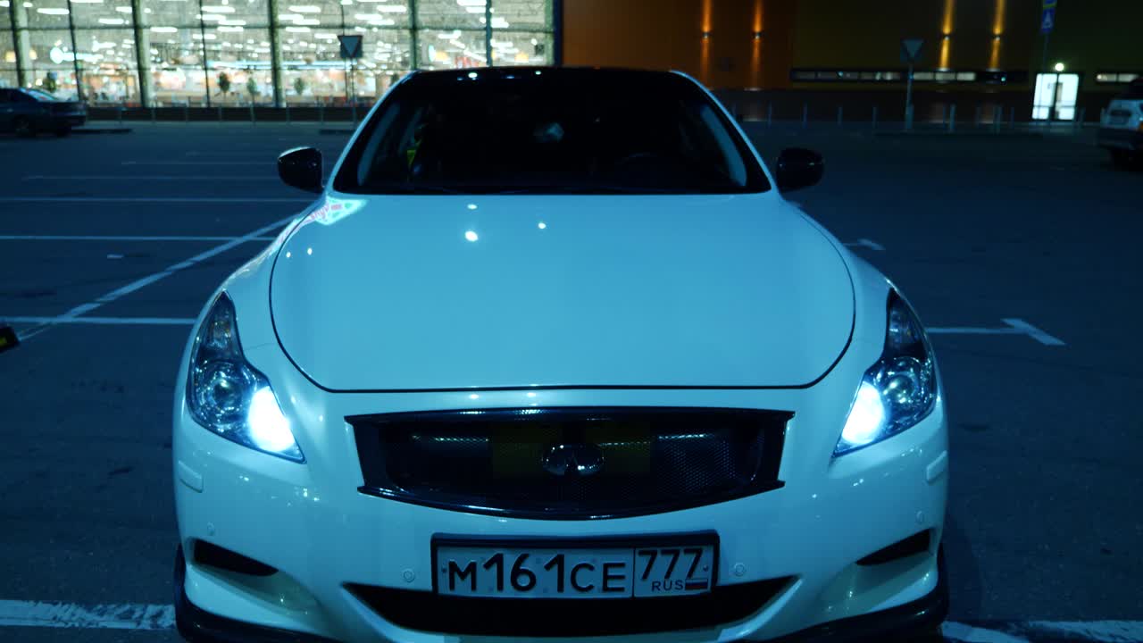 Car in a parking lot at night
