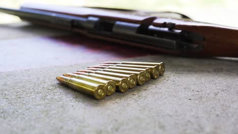 shotgun ammunitions on the table at firing range