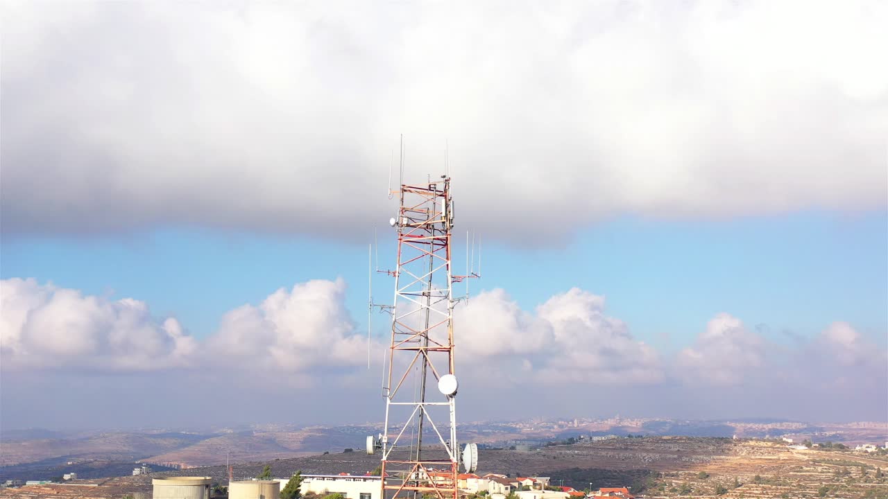 Communication Tower in a Hilly Landscape