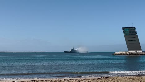 naval ship at the port on a beach