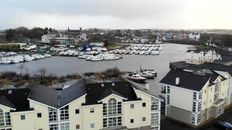 aerial - over the houses fly towards to jetty