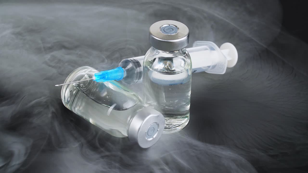 Medical Vials and Syringes in Smoke