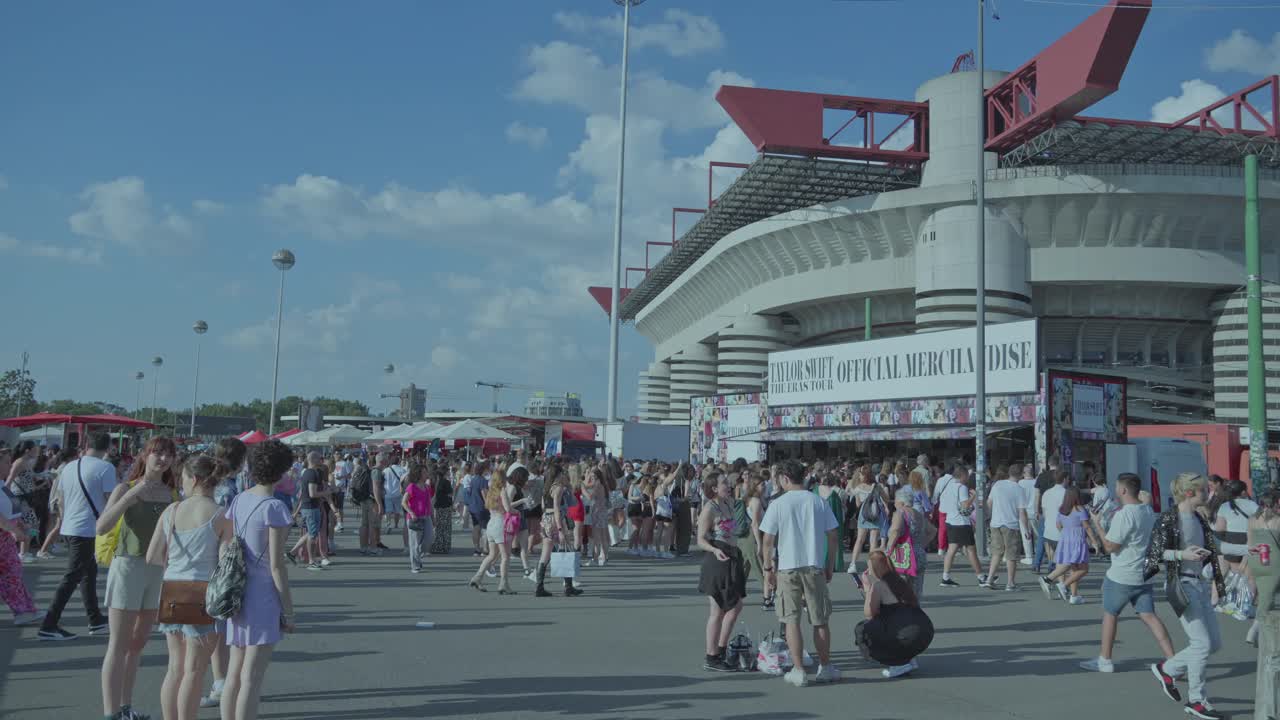 Large crowd gathers outside stadium for Taylor Swift Eras Tour merchandise