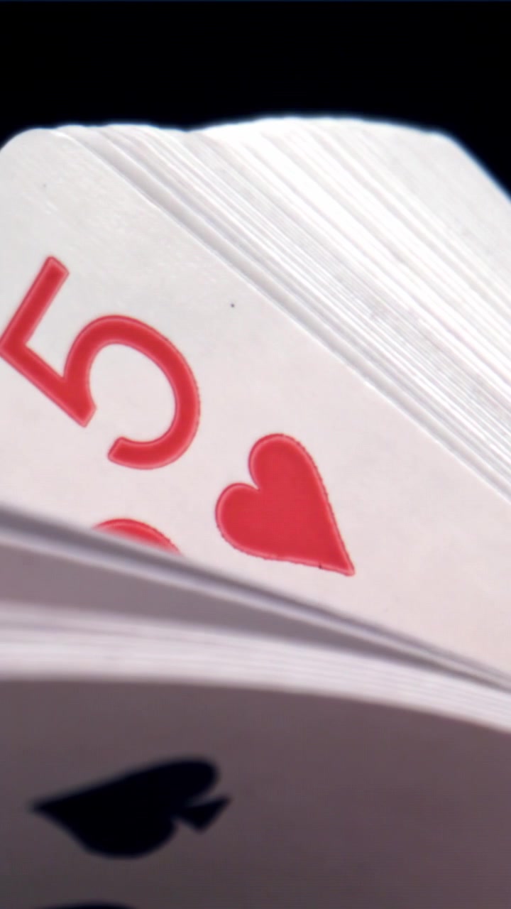 Close-up of Playing Cards Being Fanned Out