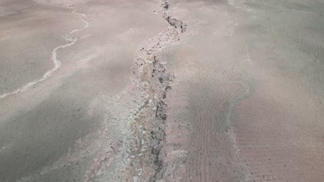 Drone-shoot-panning-through-the-Chilean-desert-stopping-at-the-horizon