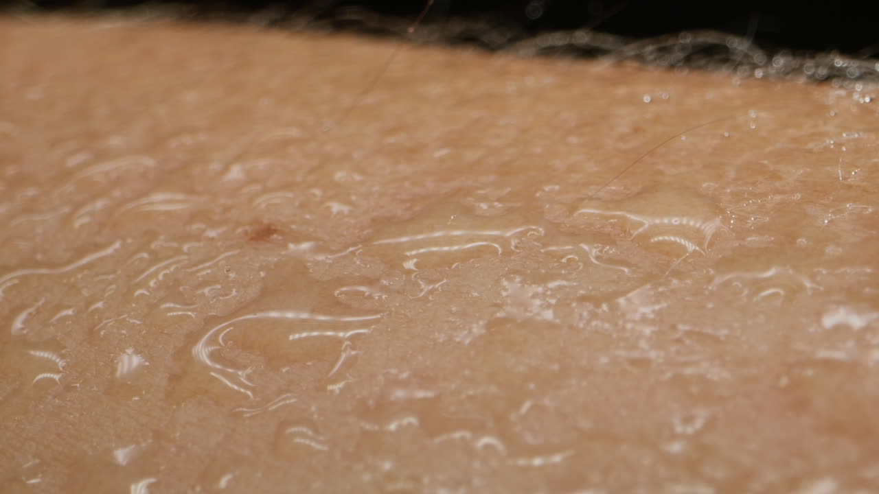 Hand skin texture close-up, hair. Arm surface macro shooting. Body and healthcare, hygiene and medicine concept.