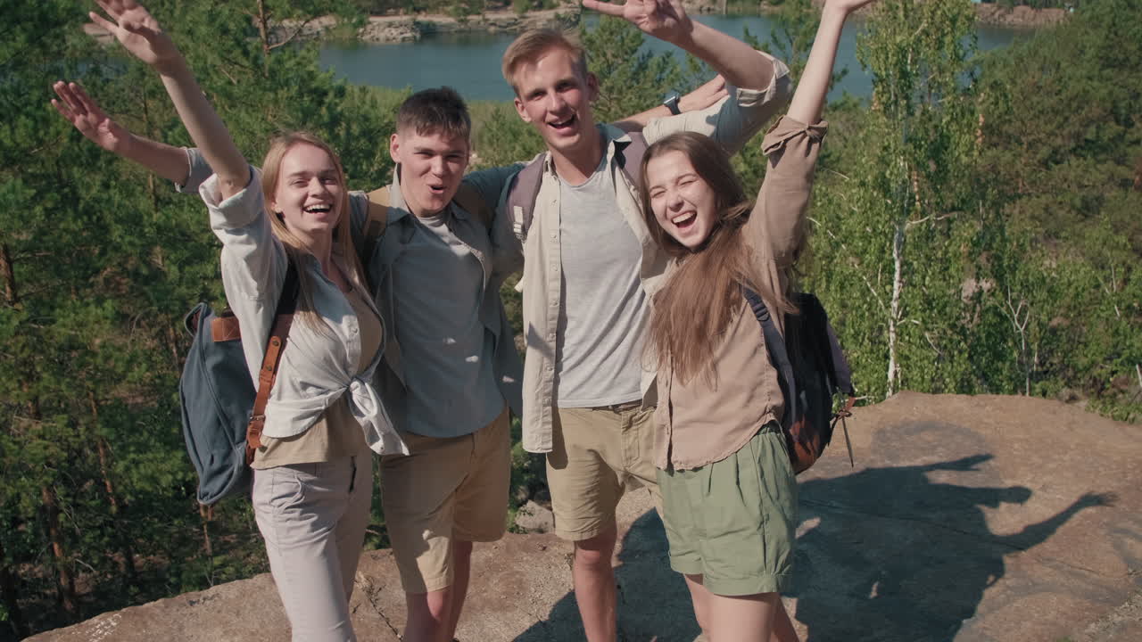 Happy Young Friends Posing for Camera on Hike