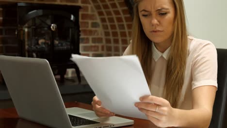 Businesswoman-working-on-her-laptop