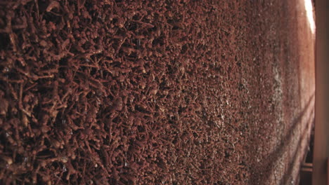 side view of salt water dripping through the bundles of brushwood in a graduation tower