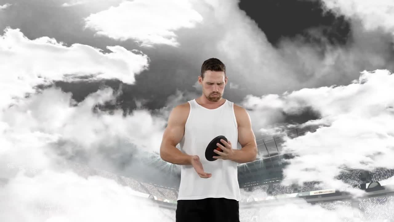 디스크 던지기 운동 선수 가 던지기 위해 준비 하고 있다