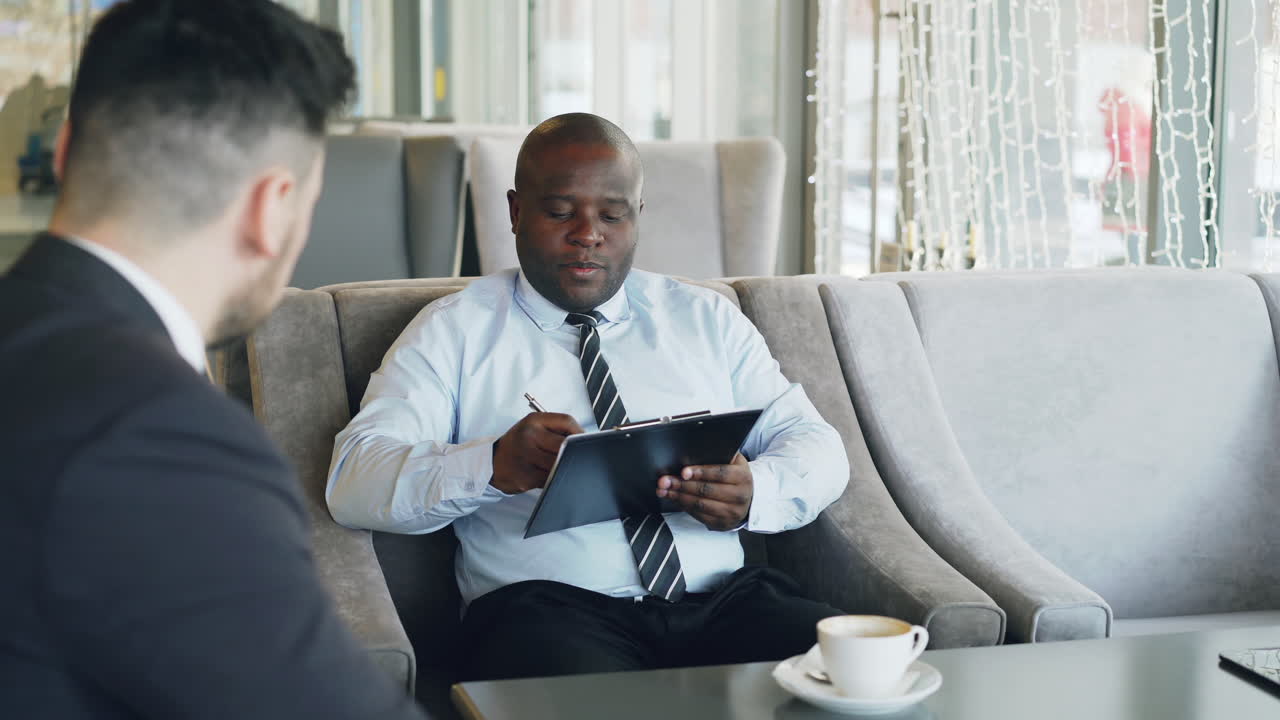 Business Meeting in a Cafe
