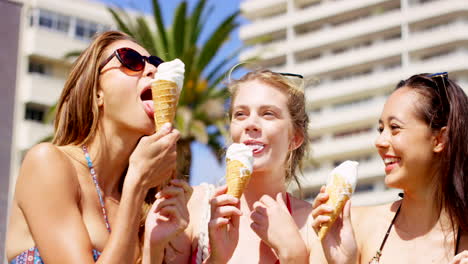 friends enjoying ice cream on a sunny day