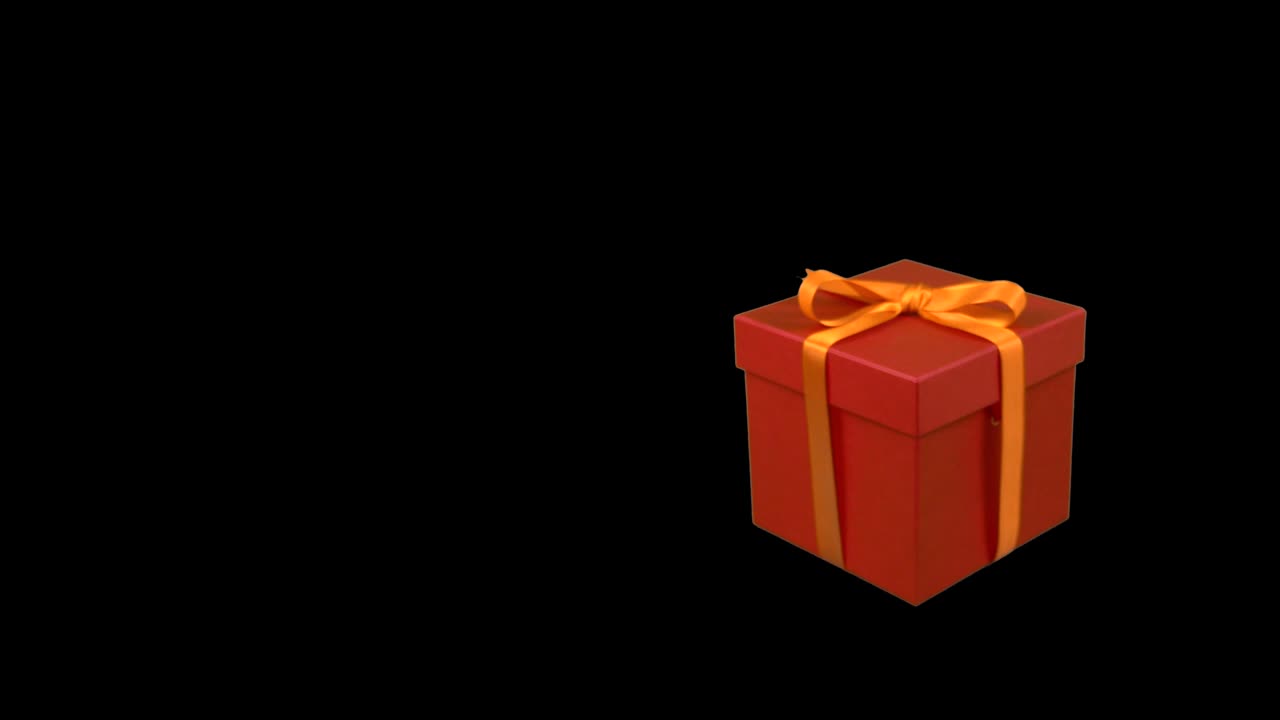 caja de regalo roja con cinta de oro amarillo bow dolly en pista en zoom en en fondo transparente. canal alfa clave de croma fondo transparente. tener espacio vacío para el texto. lr pan. enfoque suave.