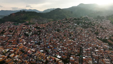 aerial view overlooking a dense community of poor homes in comuna 13, colombia