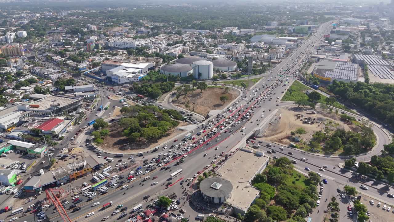 Drone circling a construction traffic jam on Duarte highway in Dominican republic