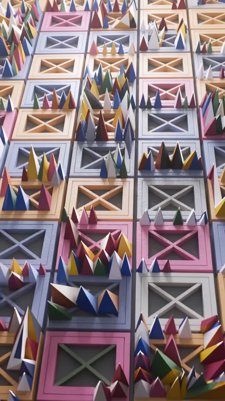 Vertical video: Tilting camera showing wall with X panels and colored cones in lobby to show scale