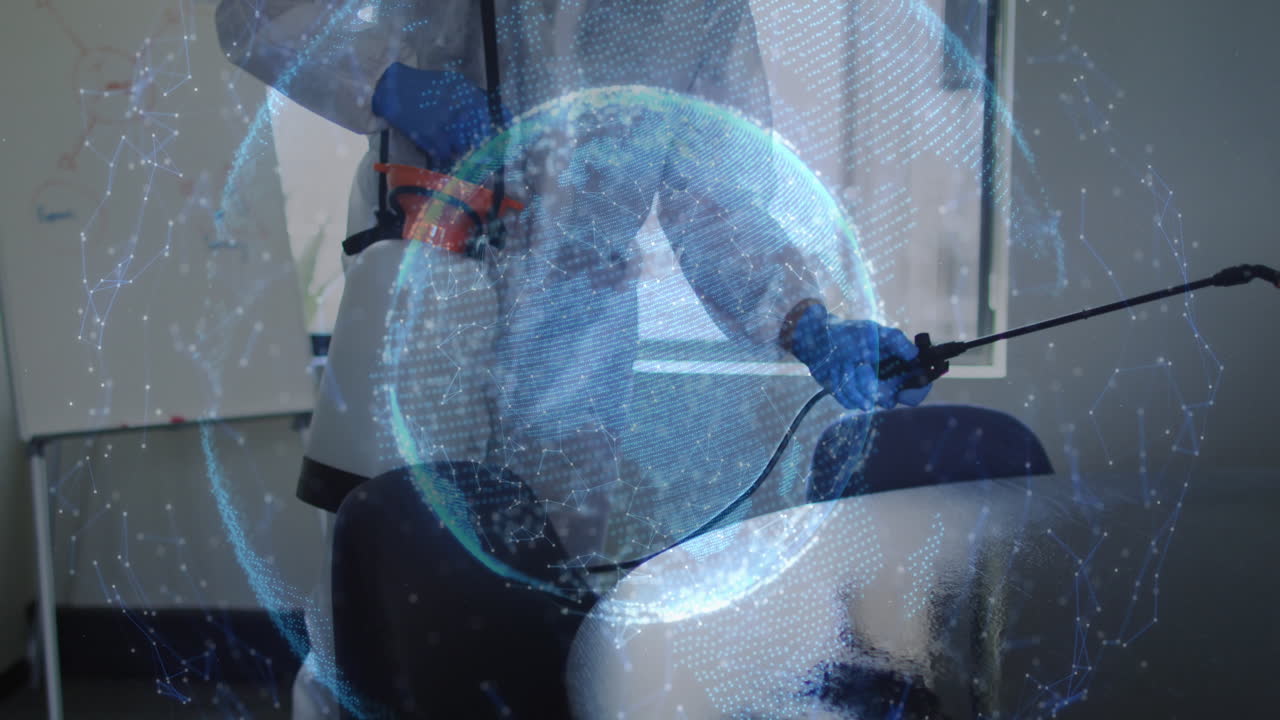 animación de un globo girando sobre un hombre que usa un traje de seguridad y desinfecta la oficina