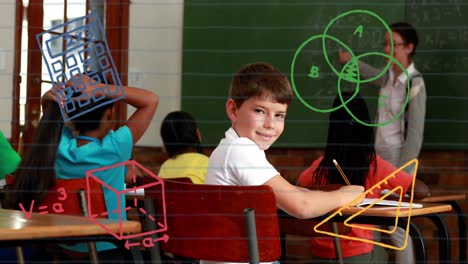 animation of school icons over caucasian schoolboy smiling in classroom with teacher and schoolmates