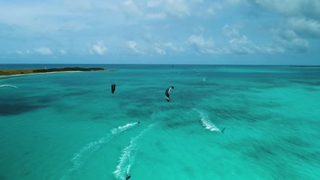 kite surfers in action on the caribbean sea