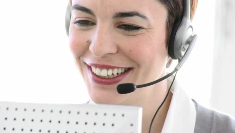 Attractive-business-woman-working-in-a-call-centre