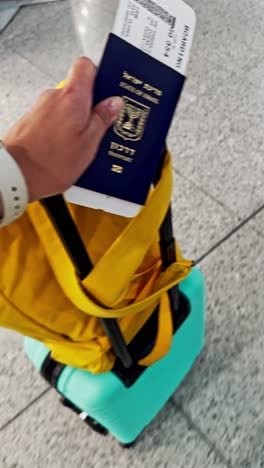 woman with white watch and passport ready for travel