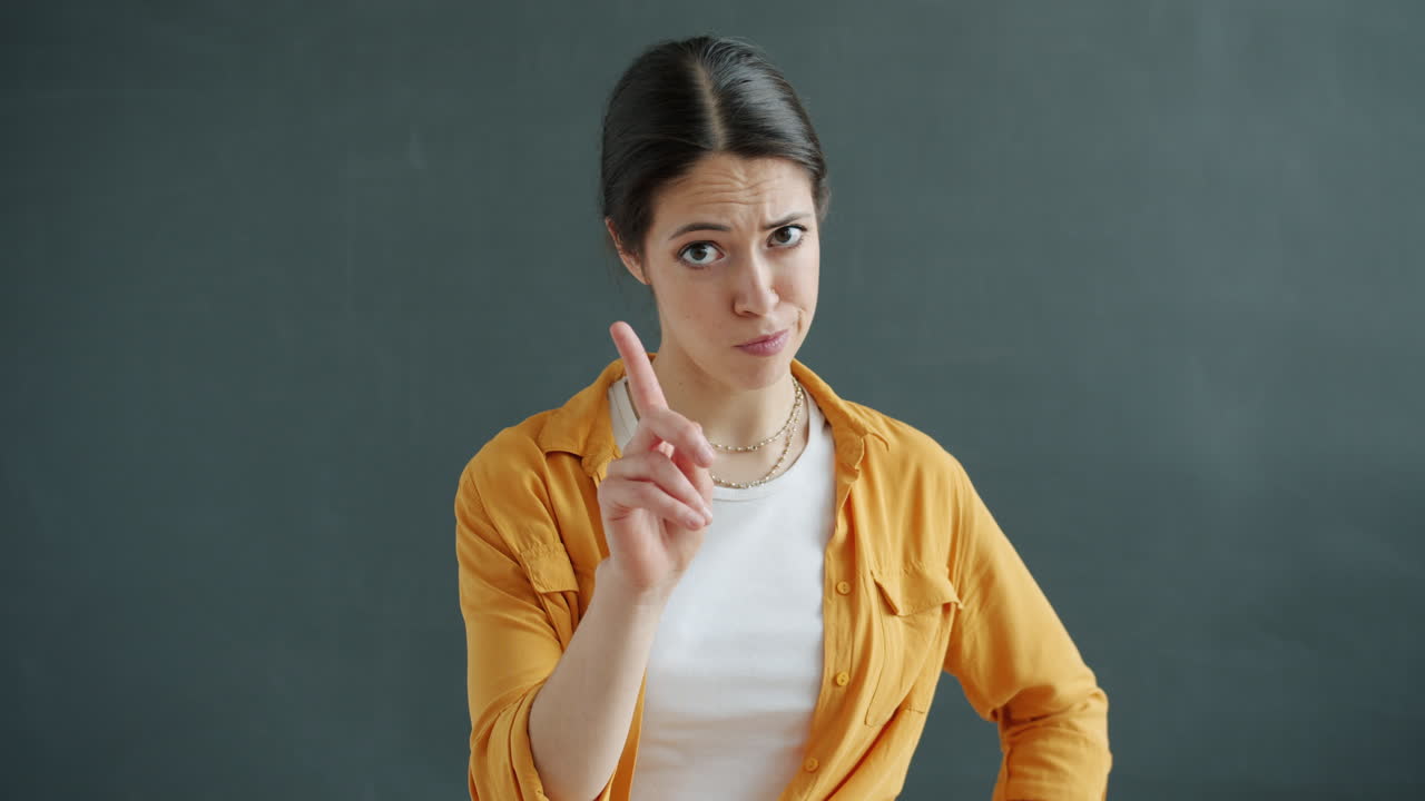 Woman pointing a finger