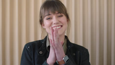 portrait of cute young woman smiling cheerful excited looking at camera enjoying surprise positive happy caucasian female