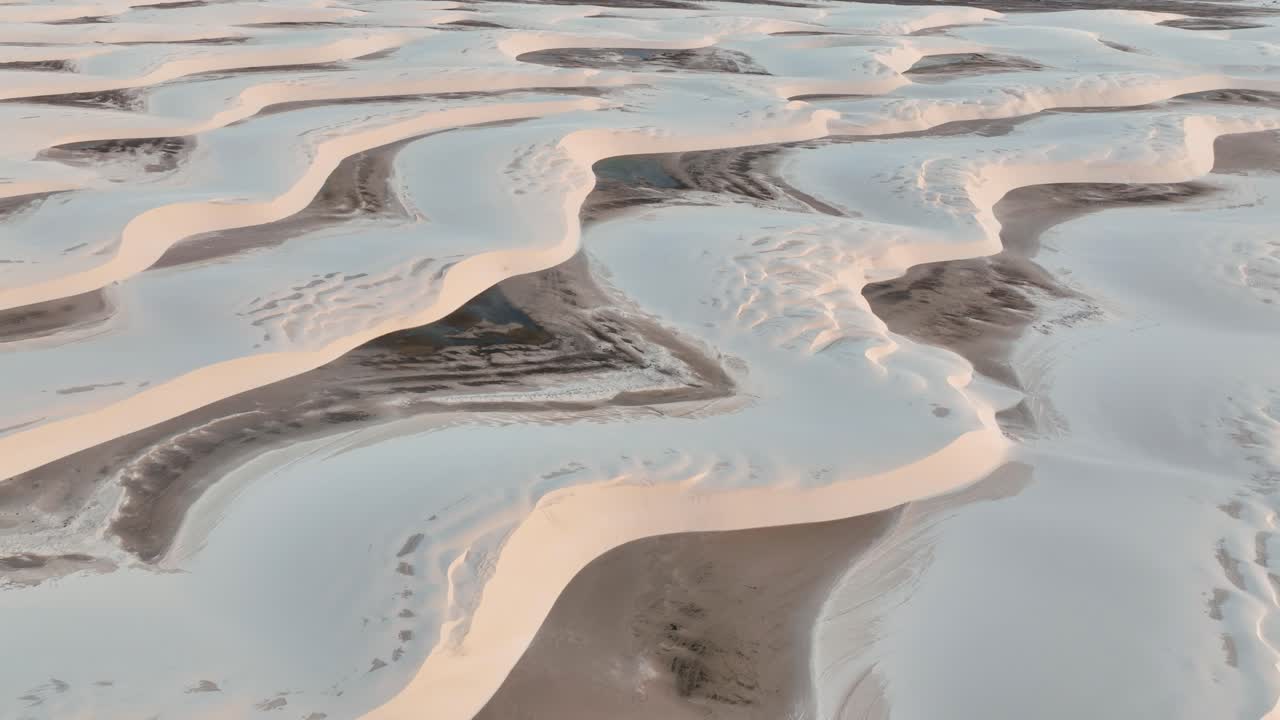 Unique Sand Dune Formation Of Lencois Maranhenses National Park In Maranhao, Brazil. aerial pullback shot