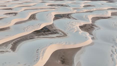 unique sand dune formation of lencois maranhenses national park in maranhao, brazil. aerial pullback shot