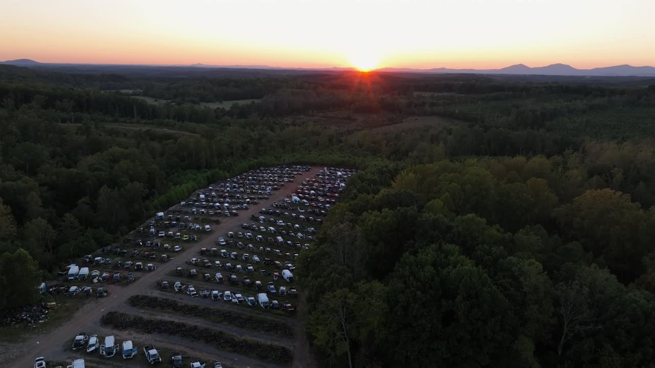 Aerial View of Car Junkyard at Sunset