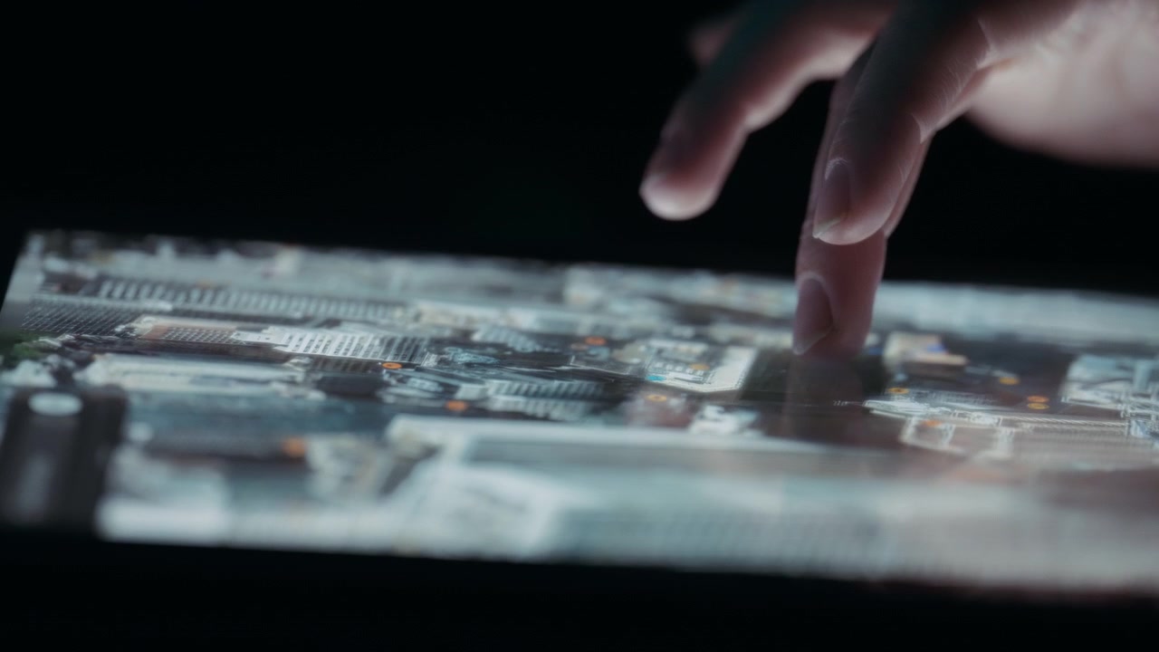 Person navigating a 3D city map on a tablet touchscreen