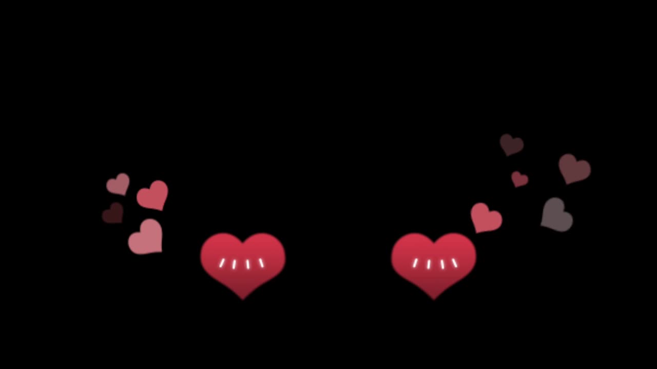 애니메이션 빨간색 심장 모양이 검은색 배경에 떠다니고 있습니다.