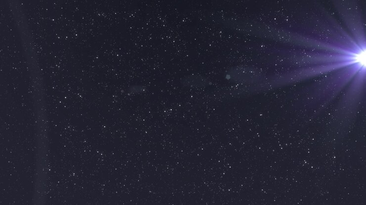 Purple spot of light glowing in the night sky